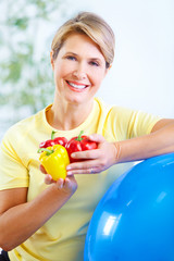 Wall Mural - Woman with pepper