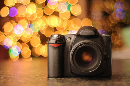Wall Mural -  - DSLR camera with Bokeh Background