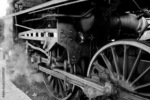 Fototapeta na wymiar Wheels of an old steam locomotive