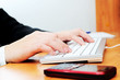 © Sergey Mironov - Female hands typing on a keyboard