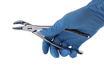 dental forceps in hand