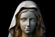 Holy Mary statue portrait isolated on black
