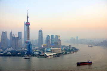 Wall Mural - Shanghai the huangpu river and Pudong skyline at sunset.