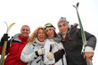 © goodluz - Group of happy friends in winter vacation