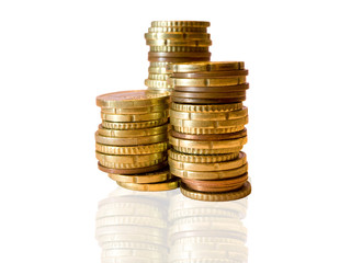 Piles of euro coins on white background