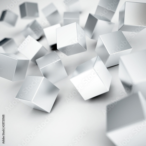 Obraz w ramie Falling and hitting gray metallic cubes on a white