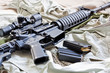 © JavaDuke - Close-up of AR-15 rifle and magazines with ammo