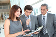 © goodluz - Business team meeting in hall