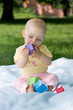 baby eating toys