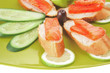 sandwich with salmon on green