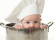 © blessings - Close up of baby sitting in stock pot