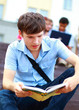 © ASDF - young man read book