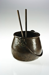 Copper pot with chopsticks