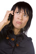 © Mehmet Dilsiz - Asian - Hispanic Businesswoman Talking on the Cell Phone