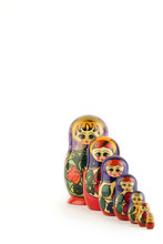 Seven Russian Dolls On A White Background