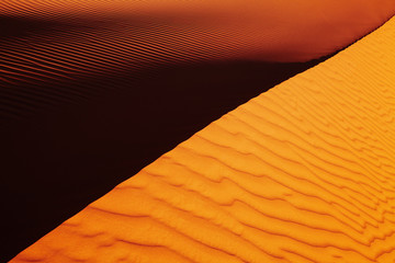 sand dune at sunset in sahara desert, algeria