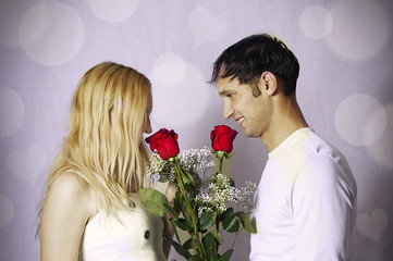 Wall Mural - valentine day. couple with roses in love