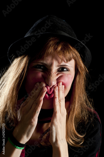 Fotografia, Obraz blonde girl deforms the face with his own hands