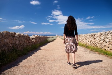 towards lighthouse at rural road