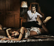 © konradbak - Two adult people in bedroom posing