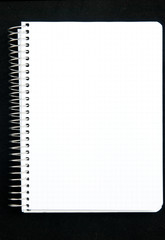 Notepad page isolated on black