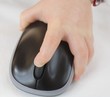 small hand on computer mouse
