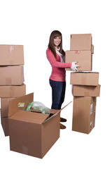 Wall Mural - young girl packing up and moving - isolated