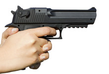 Human Hand Holding Gun