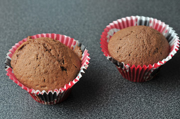 Two chocolate muffins