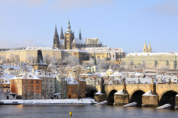 Romantic Snowy Prague gothic Castle with the Charles Bridge