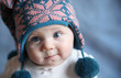 © blessings - Baby with blue eyes in a winter cap
