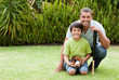 © WavebreakMediaMicro - Happy father and his son playing baseball