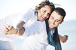 © .shock - happy young couple have fun at beautiful beach