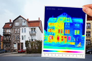 Wall Mural - thermal imaging of a half isolated apartment building