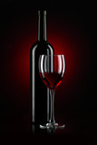 Fototapeta Panele - bottle with red wine and glass