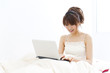 © taka - a portrait of beautiful asian woman using laptop