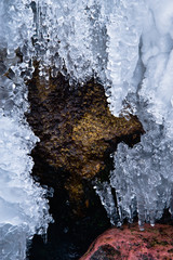 Frozen waterfall on a rocks