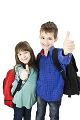 Children, schoolboy and schoolgirl showing OK sign