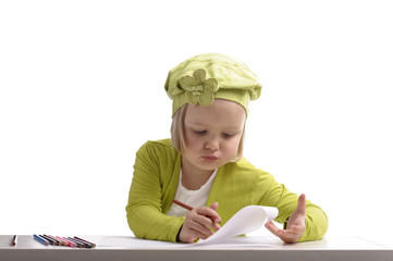 little girl drawing with pencils