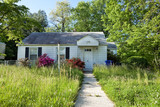 Fototapeta  - Abandoned Foreclosed Cape Cod Home Long Grass