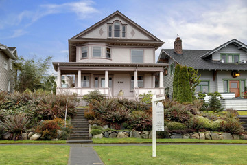 Victorian house  with large covered porch for sale