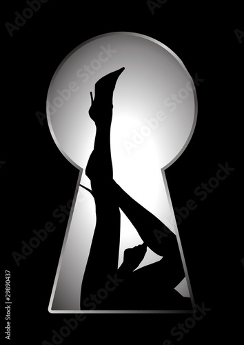Silhouette of legs of a woman seen through a key hole - 29890437