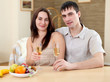 © Sergey Nivens - young couple at home having meal