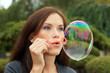 © Christopher Boswell - Woman blows bubble
