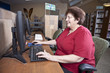 Woman using library computer