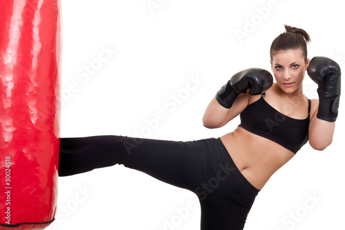 woman practicing kickbox Lerretsbilde
