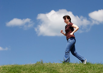 Young women jogging outdoo in casual clothes