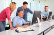 © goodluz - Group of business people working in the office