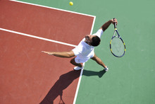 Young Man Play Tennis Outdoor