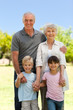 © WavebreakMediaMicro - Grandparents with their grandchildren in the park
